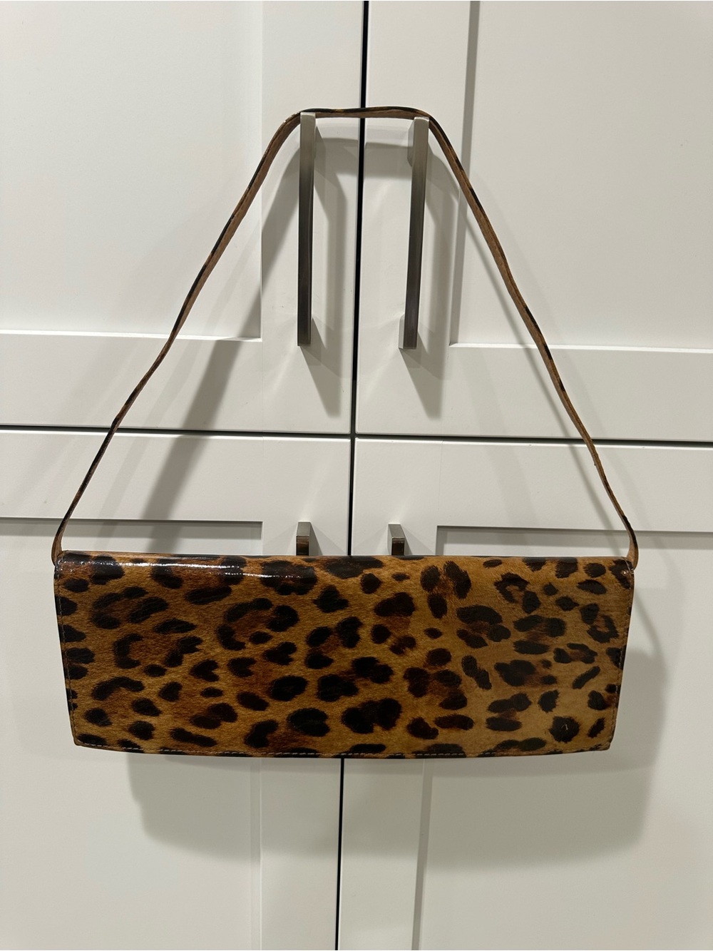 Stuart Weitzman patent leather Leopard clutch bag with a detachable strap